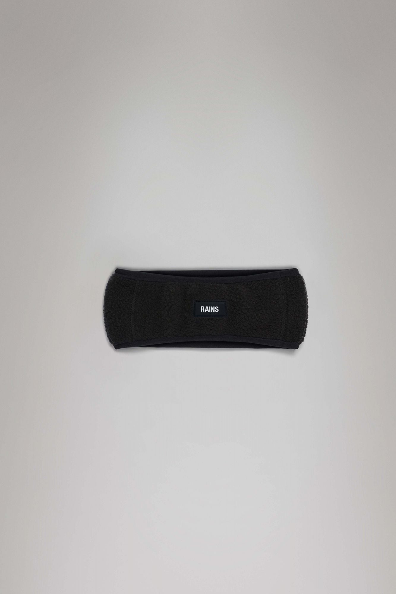 RAINS FLEECE TRAPPER HAT W2T3 en color NEGRO (1)