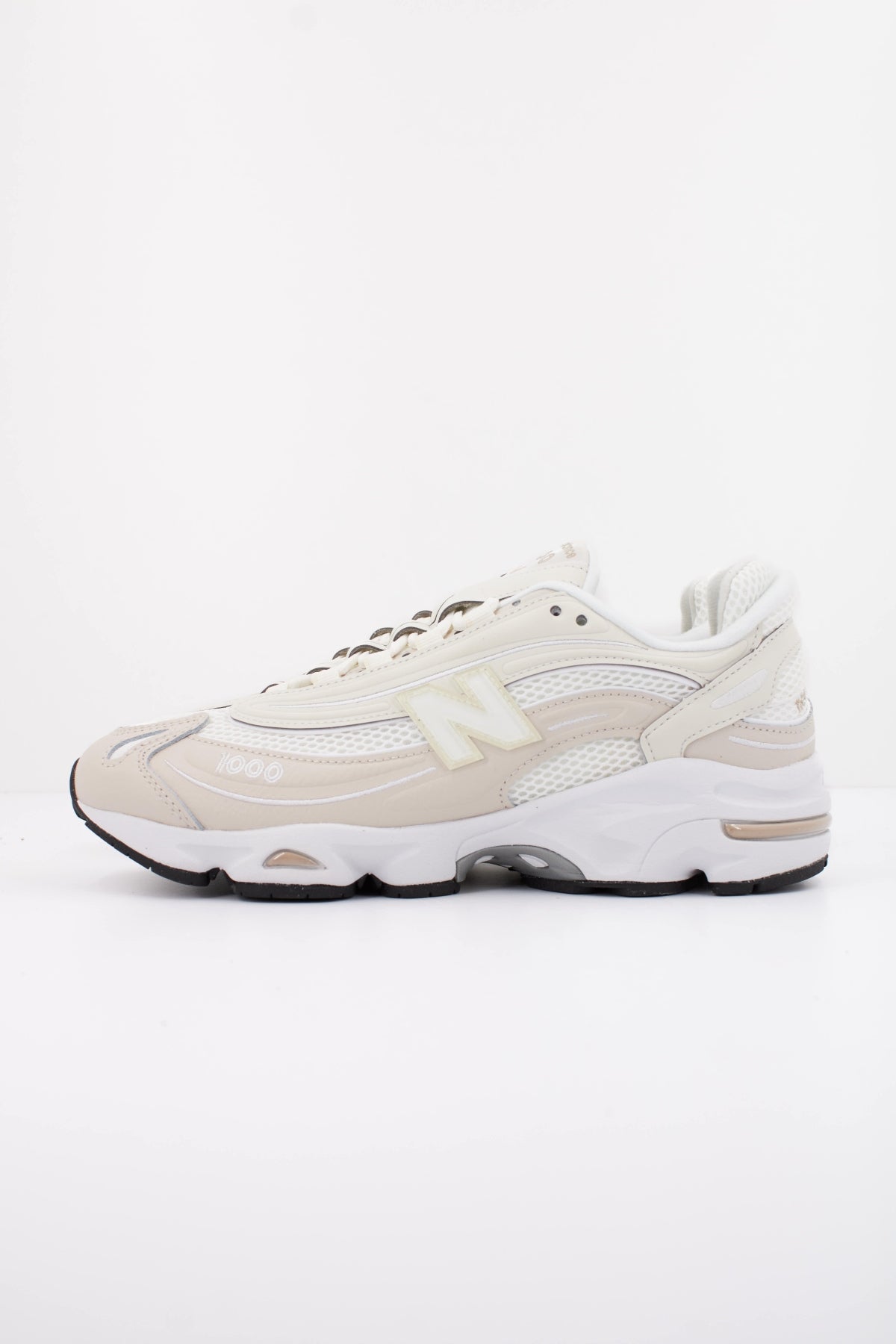 NEW BALANCE U10009  en color MARRON CLARO (1)